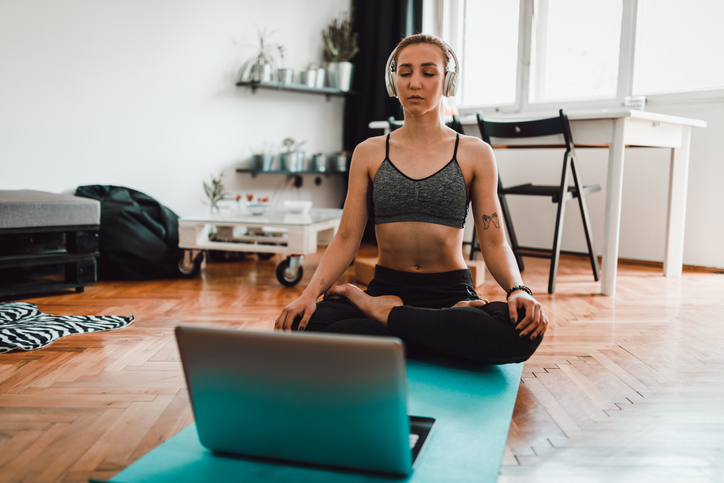 woman using virtual meditation retreat